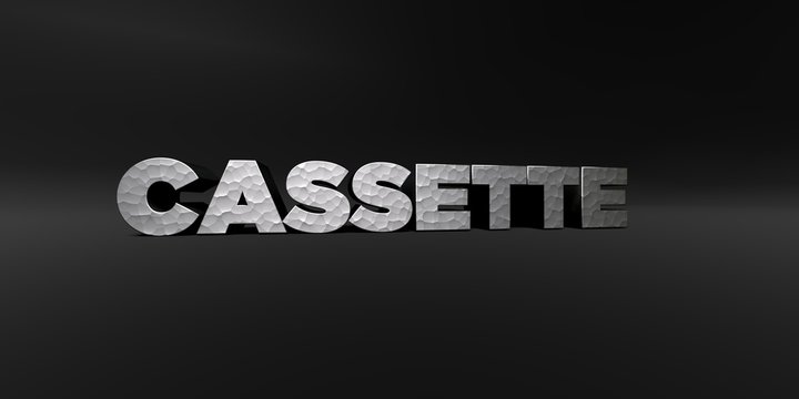 CASSETTE - hammered metal finish text on black studio - 3D rendered royalty free stock photo. This image can be used for an online website banner ad or a print postcard.
