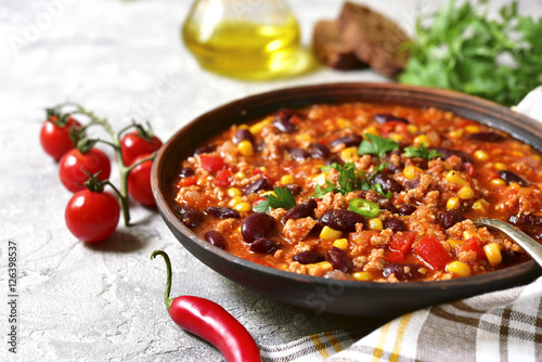 Fotografie, Obraz Chili con carne - traditional dish of mexican cuisine.