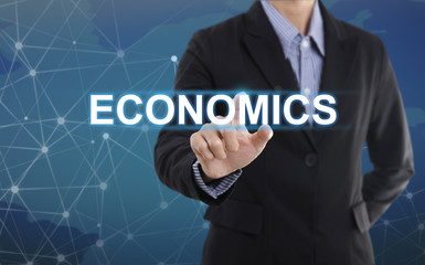 Aufkleber - Businessman hand pressing button economics.  sign on virtual screen. business concept.