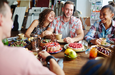 Wall Mural - Dinner of young friends