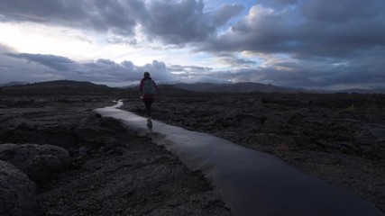 Wall Mural - Hiker Backpacker on a Cave trail Craters of The Moon National Monument Idaho