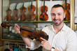 © JackF - Male musician selecting violin