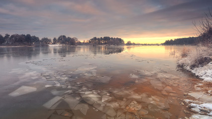 Wall Mural - thin broken ice on the lake