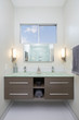 © coralimages - Modern bathroom interior with double glass sink.