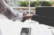 © 88studio - businessman handshake - teamwork, cooperation, agreement, acquis