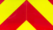yellow and red retroreflective panel on a fire truck