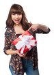 © asierromero - young woman holding a gift