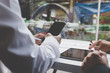 © 88studio - businessman working with document, smartphone and digital tablet