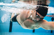 Male swimmer Under Water in Pool