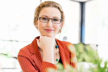 Young woman in office