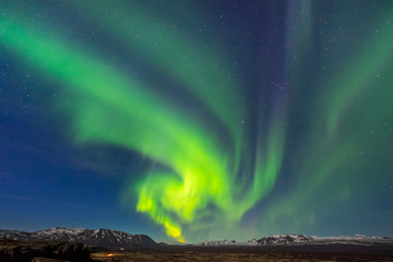 Wall Mural - aurora borealis over the thingvellir national park - iceland