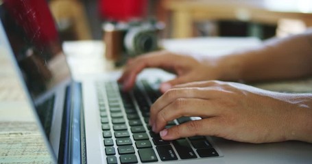 Typing on laptop keyboard