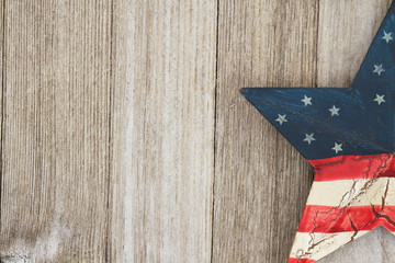Sticker - USA patriotic old flag on a star and weathered wood background