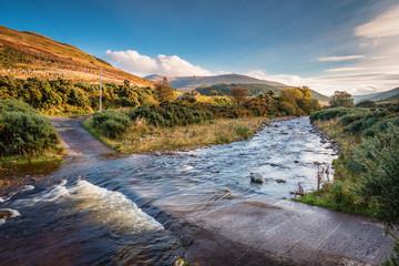 Wall Mural - ford on college burn and the cheviot, from which the hill range takes its name, is the highest point