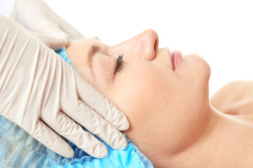 Canvas Print - Doctor preparing woman for surgery operation