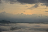 Fototapeta Niebo - Landscape Mountain and mist in the morning at Doi Pha Chu in Si Nan National Park, Nan Province, Thailand