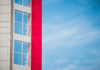 red-blue facade of urban buildings