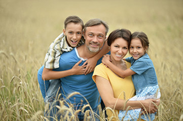 Poster - happy family at   field