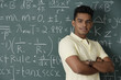 © Alexander - young man standing proudly in front of chalkboard