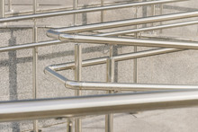 Metal Silver Railings On The Background Of A Granite Wall