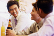 © Alexander - Young men having drinks