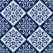 knitted seamless pattern with snowflakes in blue