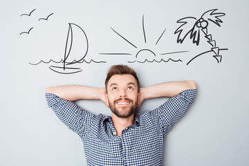 Wall Mural - Happy young man dreaming about vacation. Drawn picture of seasid