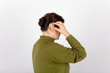 © andras_csontos - Woman inserting her hearing aid