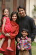 © Alexander - family of four outdoor portrait, smiling at camera