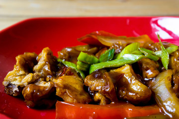 wok fried chicken stir fry with sweet peppers and chinese vegeta