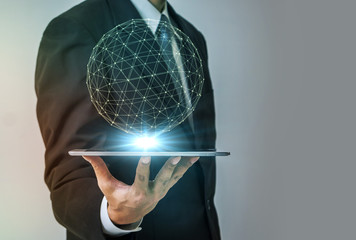 mesh network wire frame 3d rendering image, business person holding tablet pc, technological concept