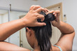 © Zenzeta - Closeup hands  woman bundle hair  preparing yoka and exercise