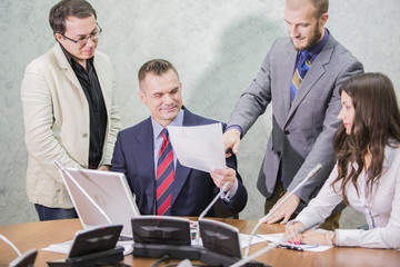 business people having a meeting conference talking about future success of the company. modern city office interior