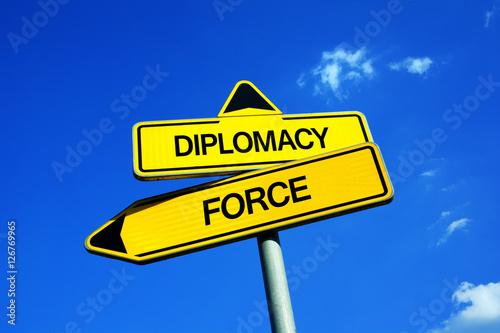 Fotografía Diplomacy or Force - Traffic sign with two options - political negotiation, deal and treaty vs military power of army