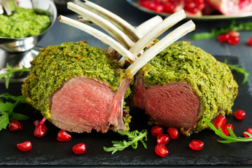 Canvas Print - Rack of lamb in herb cheese and breadcrumbs. A festive meal. Selective focus.