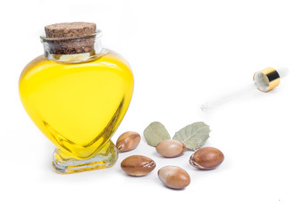 Wall Mural - Bottle with oil. Cosmetic means. Food product. Jar with argan oil on the isolated background.
