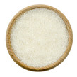 White granulated sugar in bowl isolated