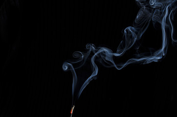 Incense Smoke on Black Background