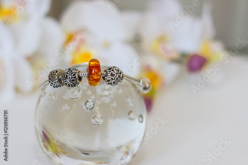 Charms bracelet. A small box with jewelry. Best gift. Poster