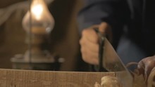 Master Carpenter Makes Basting On The Board With A Pencil, Draws, Craftsman Work Tool In The Workshop.