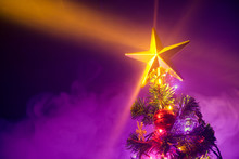 Christmas Tree With Shining Star And Frozen Mist