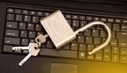 Open Padlock on Keyboard Security Hacking concept