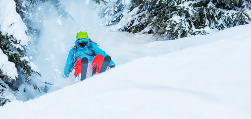 Wall Mural - Freeze motion of freerider in deep powder snow