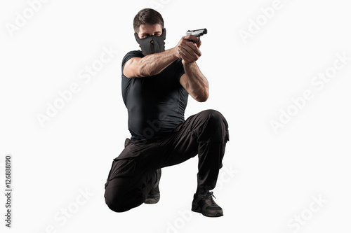 Cuadros en Lienzo Soldier shooting gun isolated on white