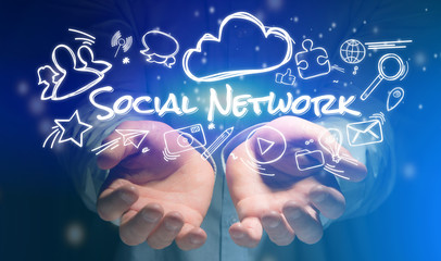 Concept of hands holding social network icon around
