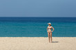 © lenblr - Young beautiful women on the sunny tropical beach in bikini. copy space