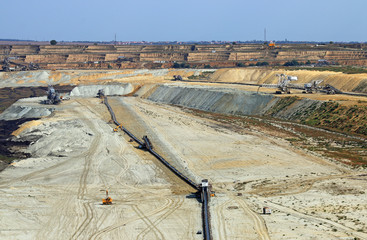 Wall Mural - open pit coal mine with heavy machinery and excavators