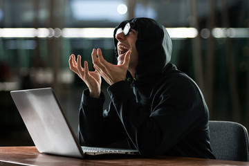 Nerd in front of his computer