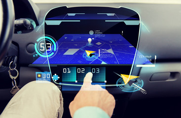 Poster - close up of man with gps navigator on car computer