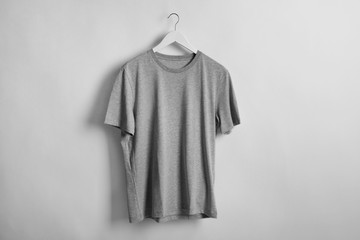 Poster - Blank grey t-shirt on light background